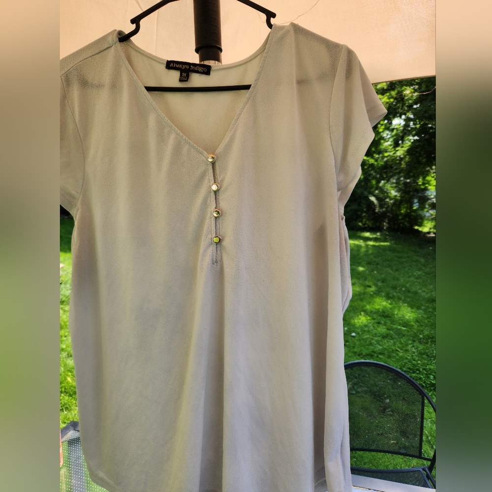 Cream Top with Subtle Details